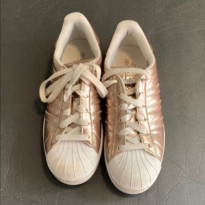 Rose gold Adidas sneakers